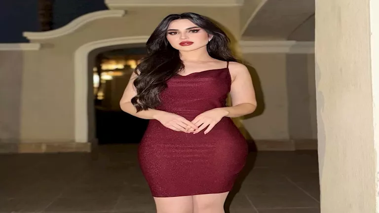 11-صورة-جديدة-لزوجة-محمد-عواد-نجم-الزمالك-بفستان-أحمر.webp.webp
