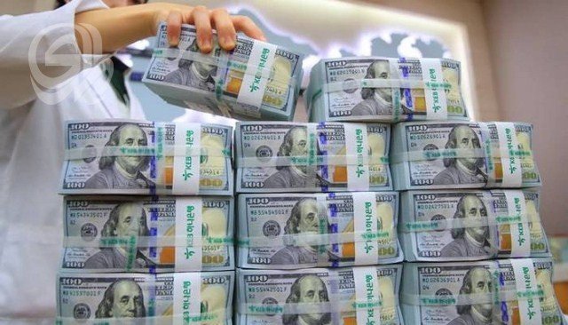 بعد-أشهر-من-التجميد-واشنطن-تعيد-تحويل-الدولار-إلى-العراق.jpg