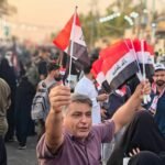 جدل-الأعلام-يرافق-الزيارة-الأربعينية-مبادرات-وطنية-وآراء-متباينة.jpg
